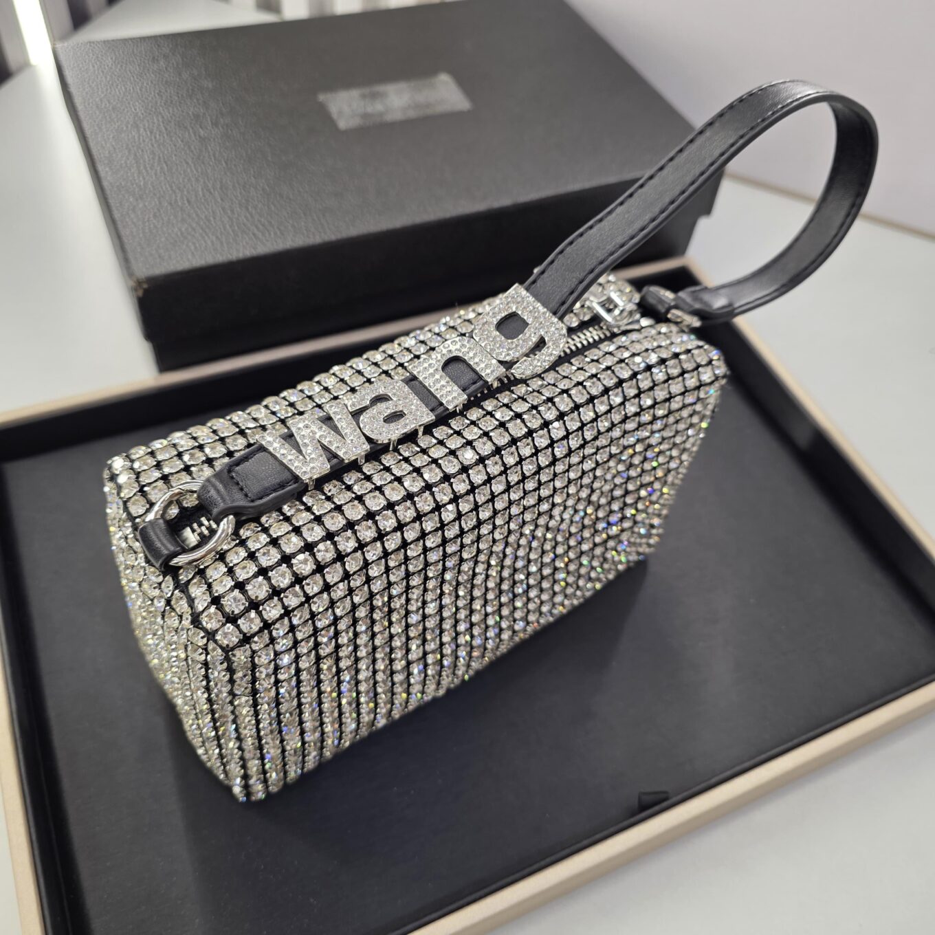 WhatsApp Image 2025-09-09 at 3.59.39 PM Alexander Wang Iconic Silver Clutch Sling Bag (With Box)