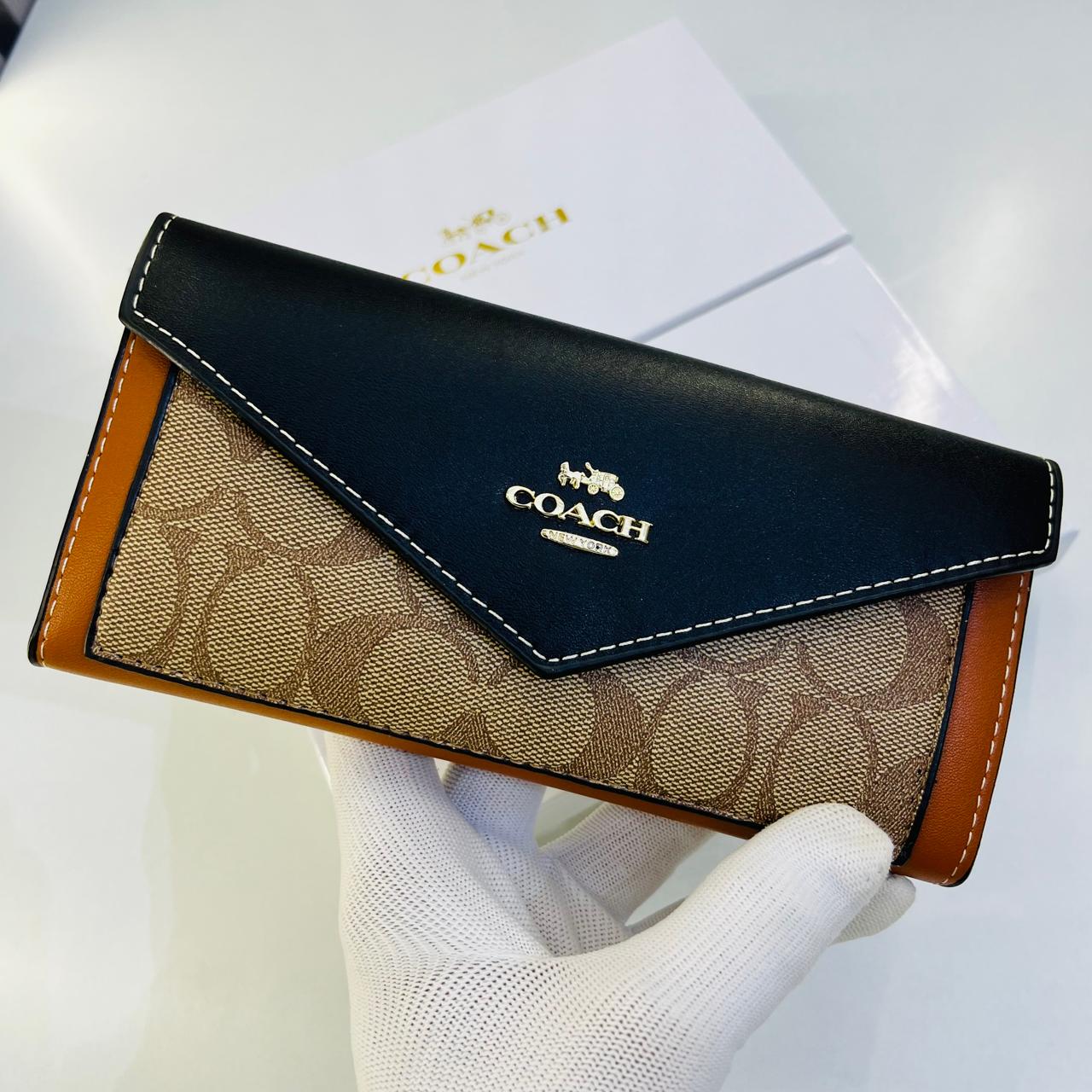 WhatsApp Image 2024-06-07 at 7.29.05 PM Coach Black Brown Three Fold Women’s Wallet