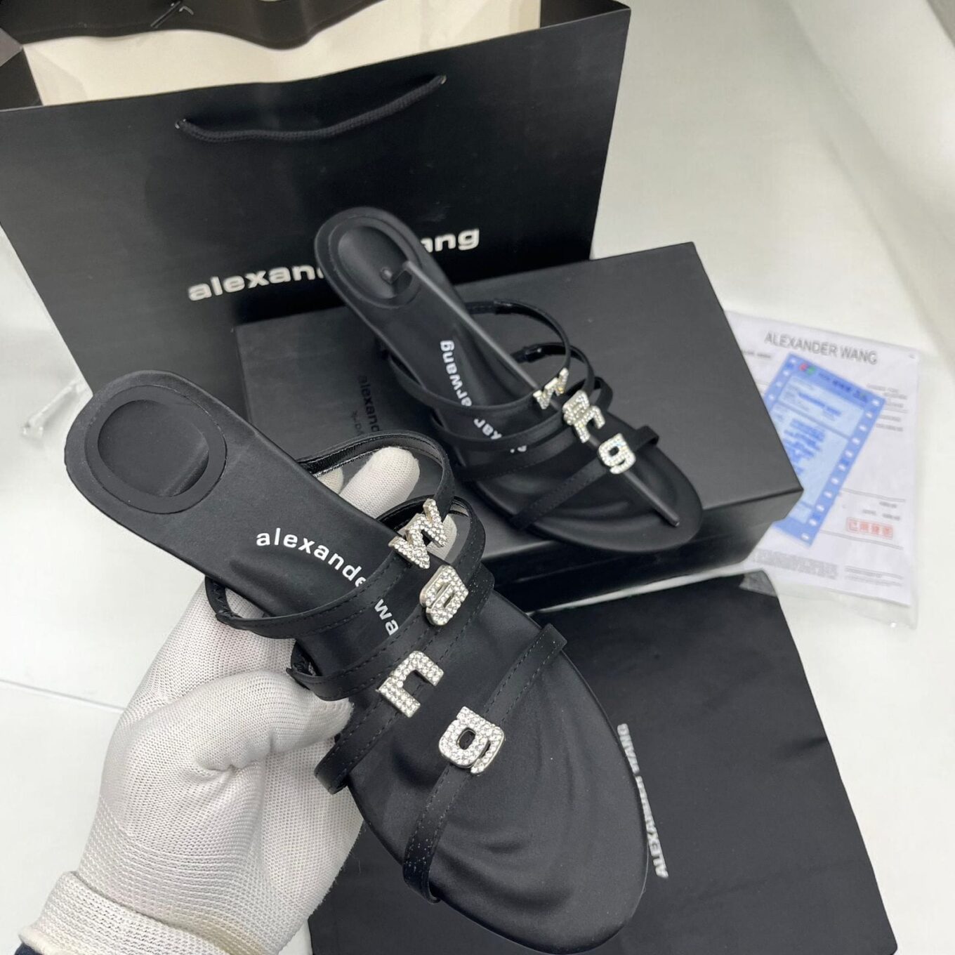 WhatsApp Image 2024-11-29 at 6.18.59 PM (1) Alexander Wang Nala Logo Black Heel