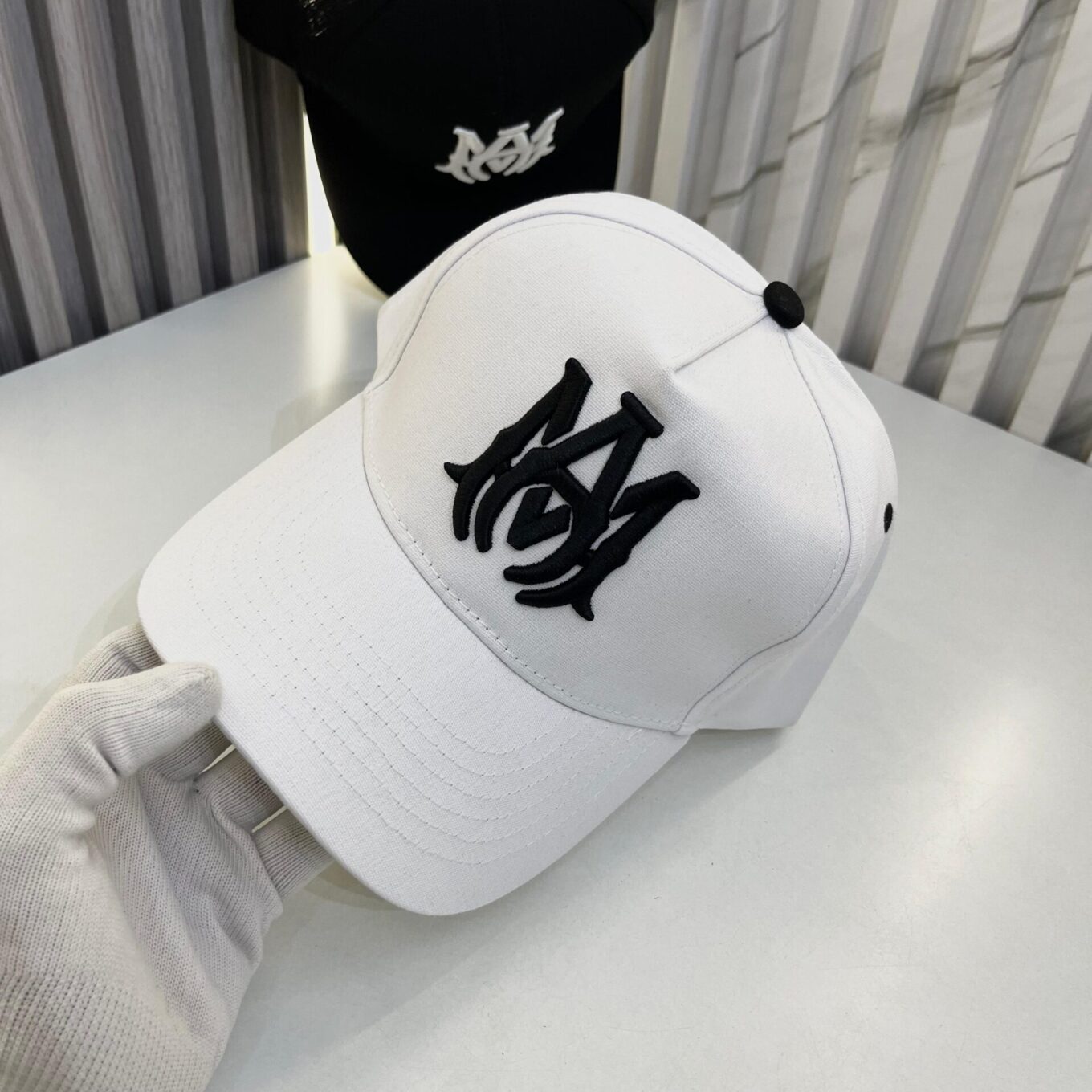 WhatsApp Image 2025-06-17 at 5.04.27 PM Amiri White Logo Baseball Cap