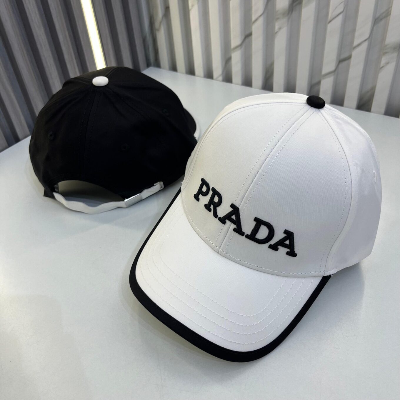 WhatsApp Image 2025-06-18 at 10.26.26 AM Prada White Black Baseball Cap