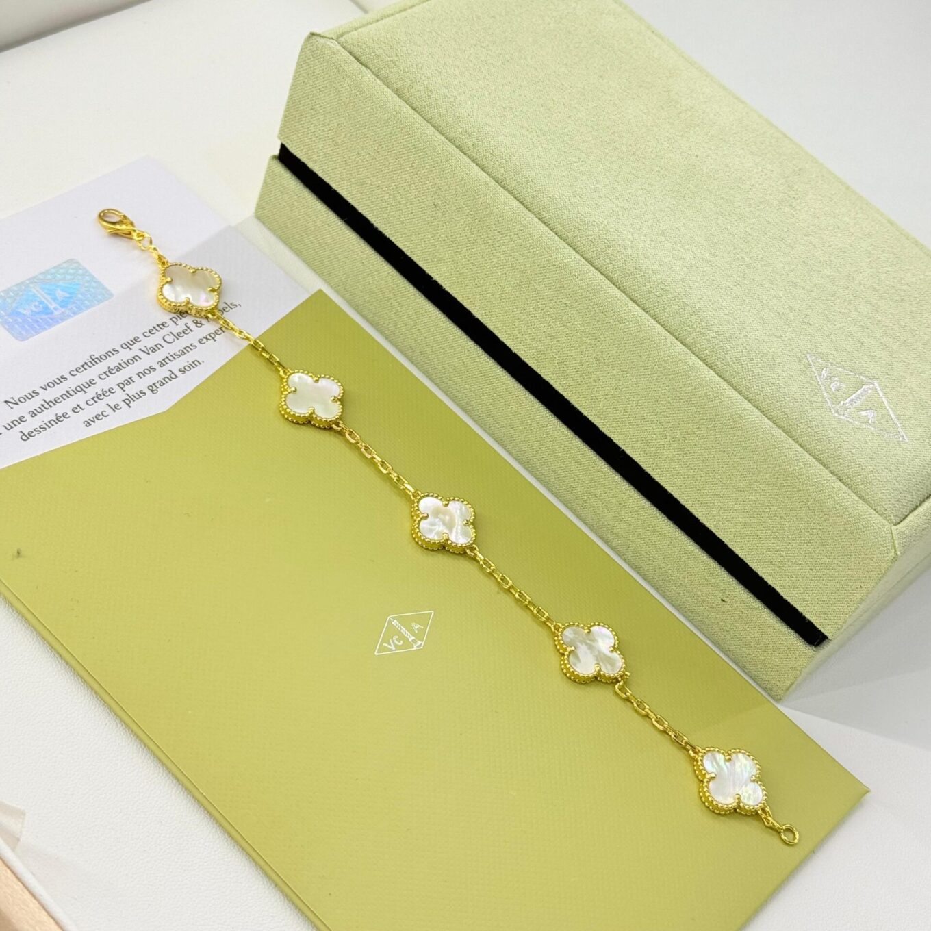 WhatsApp Image 2025-09-05 at 5.49.44 PM Van Cleef Alhambra White Marble Clover Gold Color Bracelet