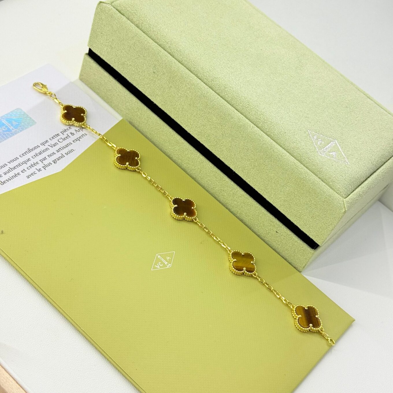 WhatsApp Image 2025-09-05 at 6.02.14 PM Van Cleef Alhambra Brown Marble Clover Gold Color Bracelet