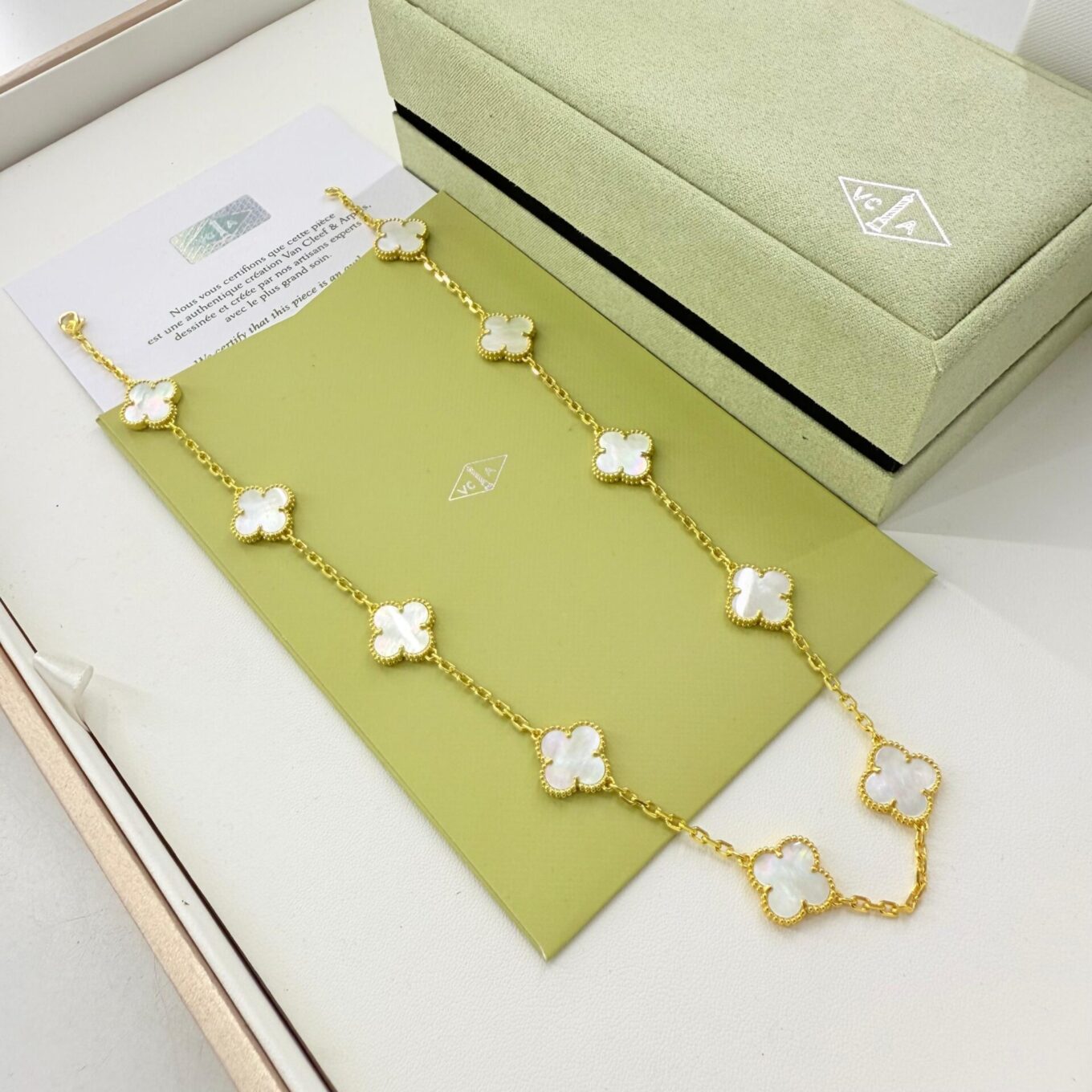 WhatsApp Image 2025-09-05 at 7.15.52 PM Van Cleef Alhambra White Marble Clover Gold Color Necklace