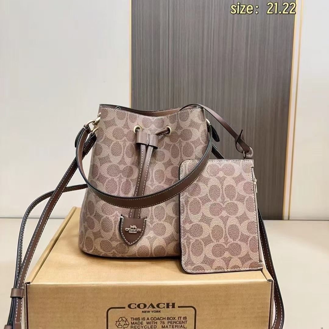 WhatsApp Image 2025-09-17 at 5.08.59 PM Coach Rowan Signature Apricot Brown Bucket Sling Bag (With Box)