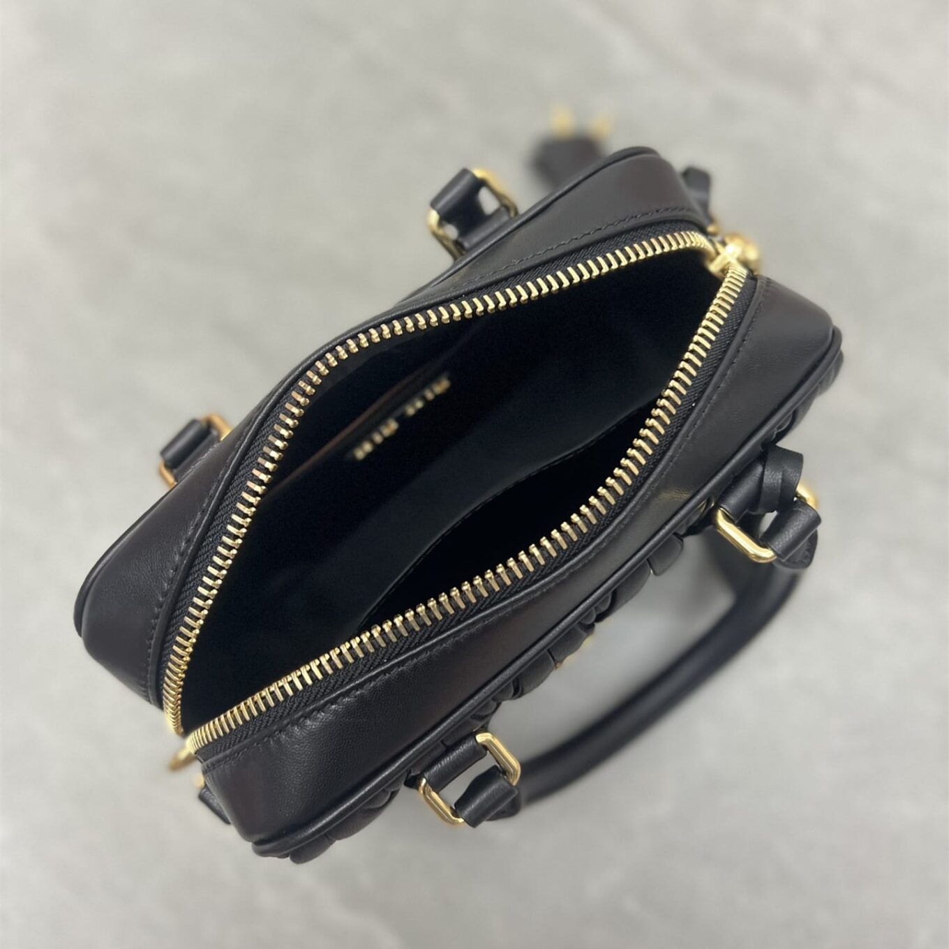 WhatsApp Image 2025-09-20 at 9.30.47 PM (1) Miu Miu Arcadie Matlasse Nappa Black Bowling Bag (With Box)