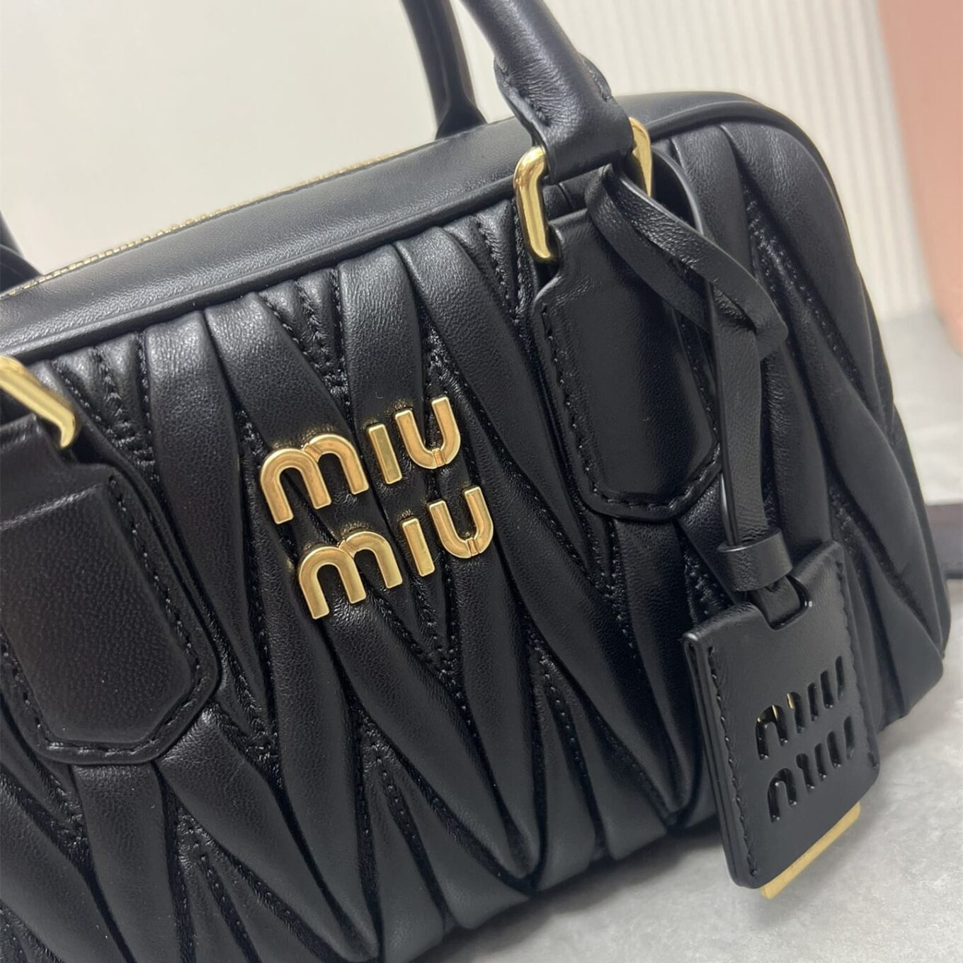 WhatsApp Image 2025-09-20 at 9.30.48 PM (1) Miu Miu Arcadie Matlasse Nappa Black Bowling Bag (With Box)