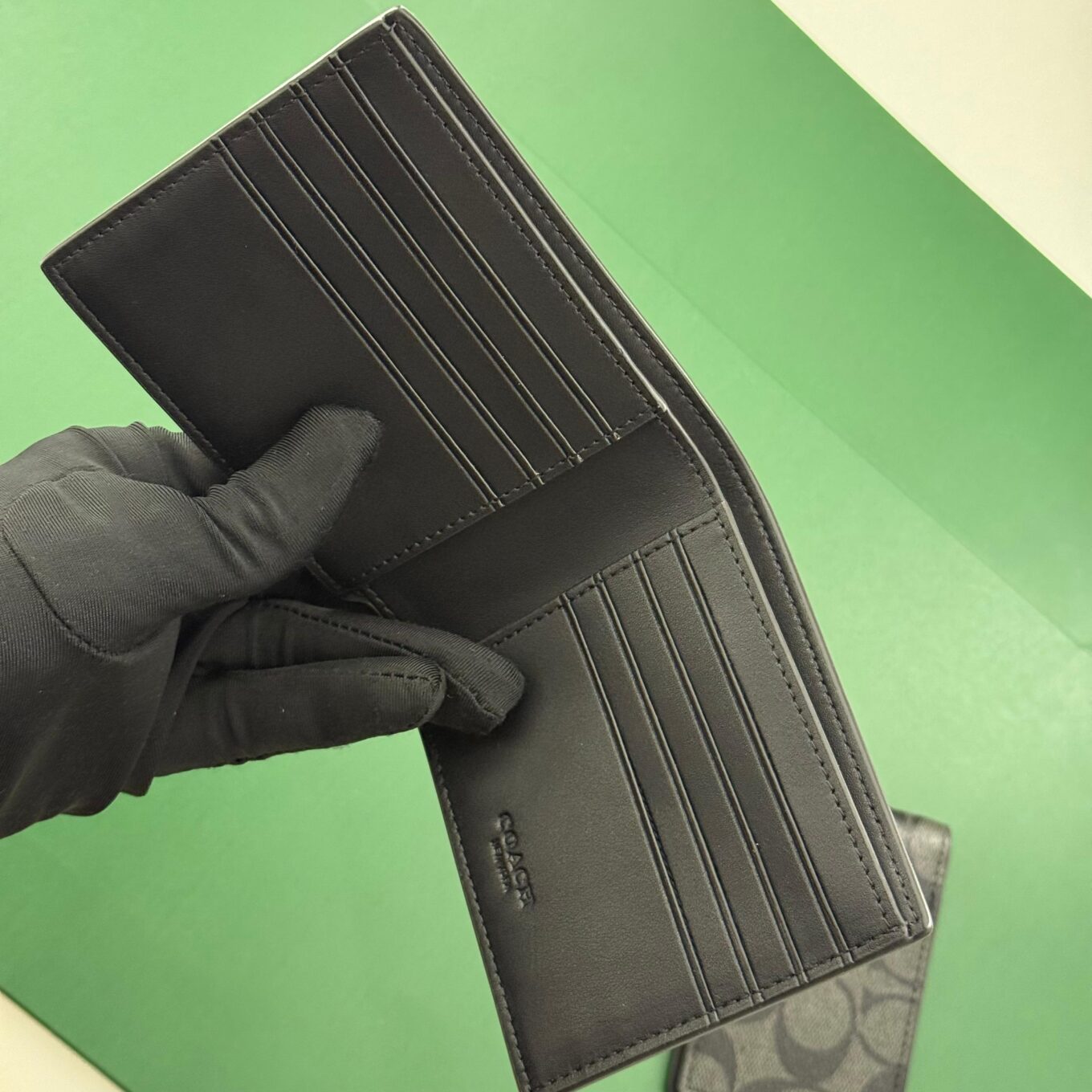 WhatsApp Image 2025-09-29 at 5.55.09 PM Coach Black Canvas Green Patch Men’s Wallet With Card Holder