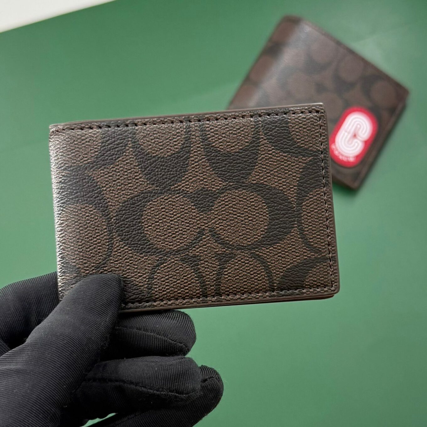 WhatsApp Image 2025-09-29 at 5.57.00 PM (1) Coach Coffee Canvas Red Patch Men’s Wallet With Card Holder