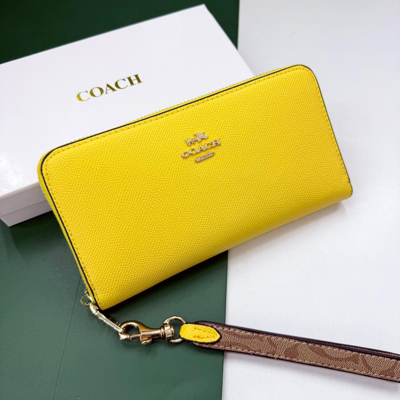 WhatsApp Image 2025-10-06 at 10.15.02 PM Coach Accordion Yellow Zipper Wallet