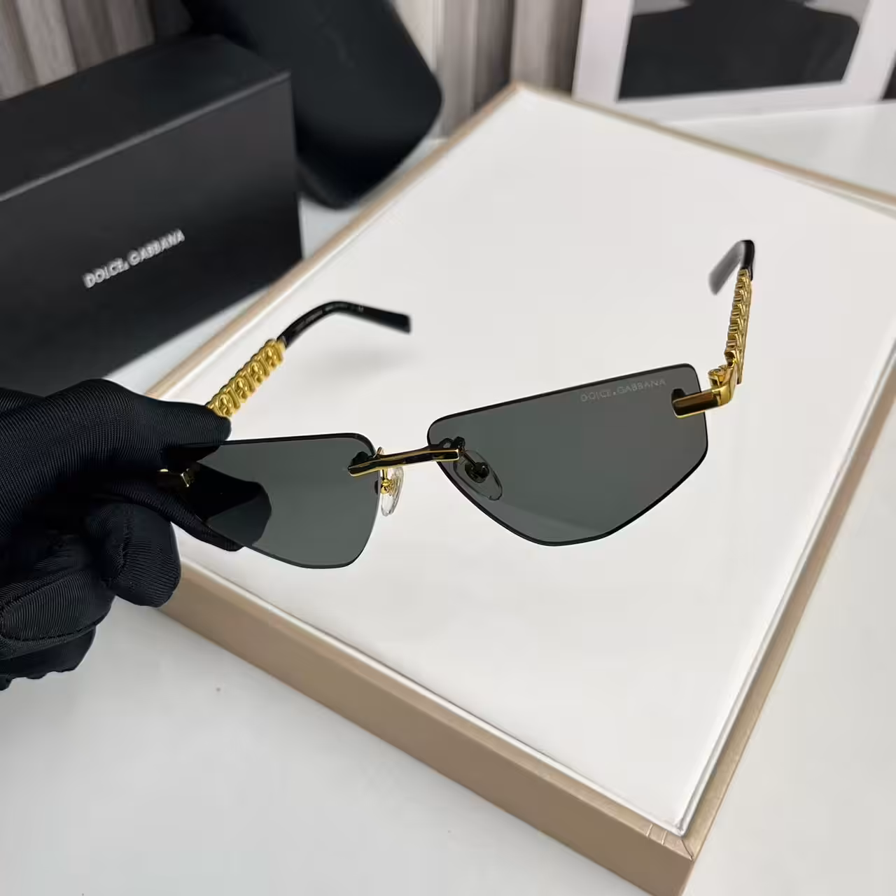 WhatsApp Image 2025-11-13 at 6.58.43 PM (1) Dolce & Gabbana Premium Gold Chain Rimless Sunglasses