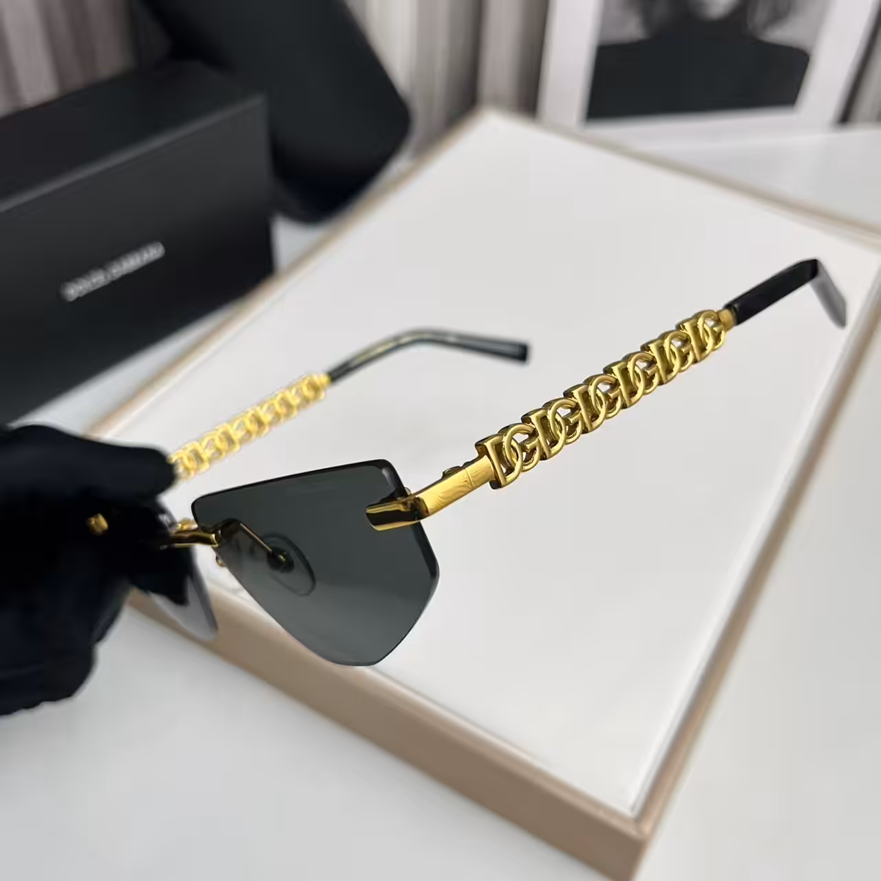 WhatsApp Image 2025-11-13 at 6.58.43 PM (2) Dolce & Gabbana Premium Gold Chain Rimless Sunglasses