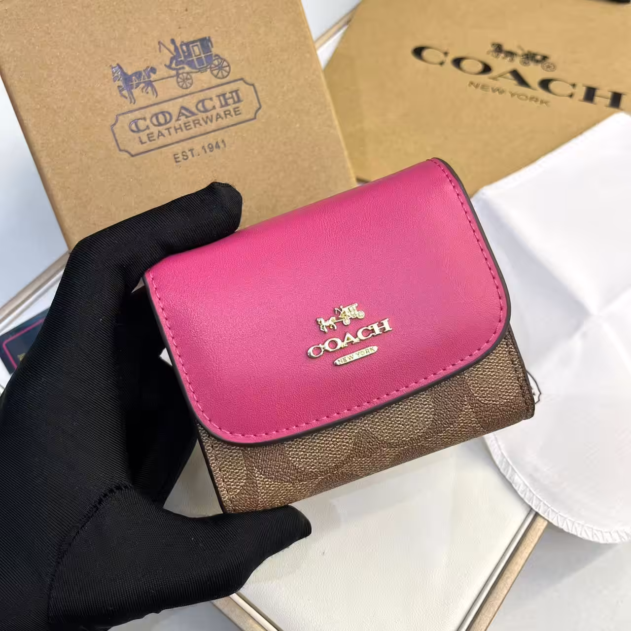 WhatsApp Image 2025-12-02 at 6.44.51 PM (1) Coach three Fold Apricot Rose Pink Wallet