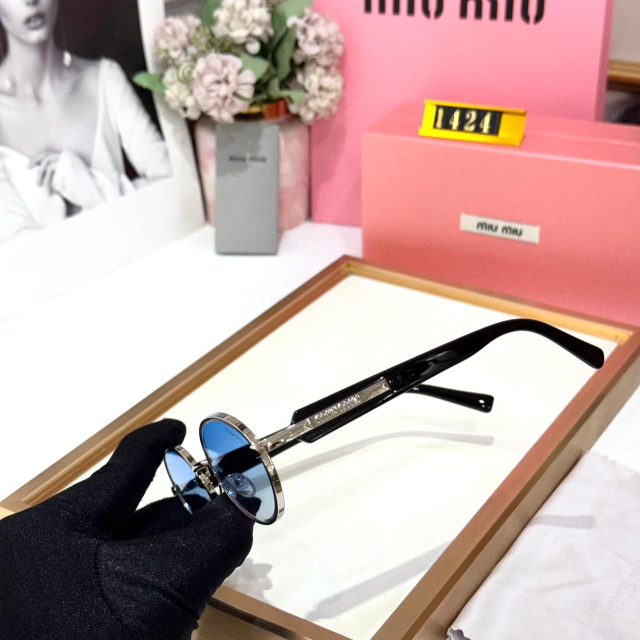 WhatsApp Image 2026-01-09 at 7.01.03 PM Miu Miu Silver Round Blue Sunglasses for Women