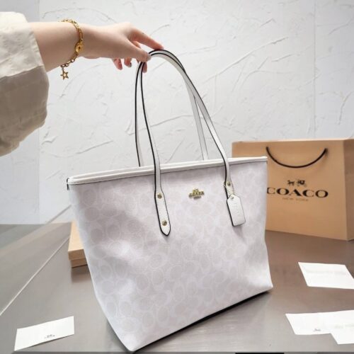 WhatsApp Image 2026-06-02 at 8.06.45 PM Coach White Signature City Tote Bag (With Box)